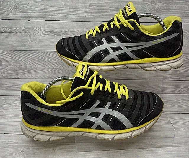 Asics Gel Zaraca 2 Turnschuhe Größe 10,5 UK schwarz gelb Laufschuh sportlich