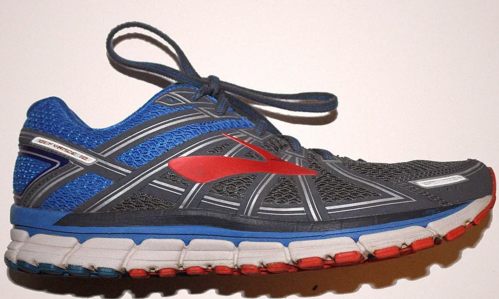 Brooks Defyance 10 Herren Laufschuhe Sneaker Gr. 45 Running Schwarz Blau Rot