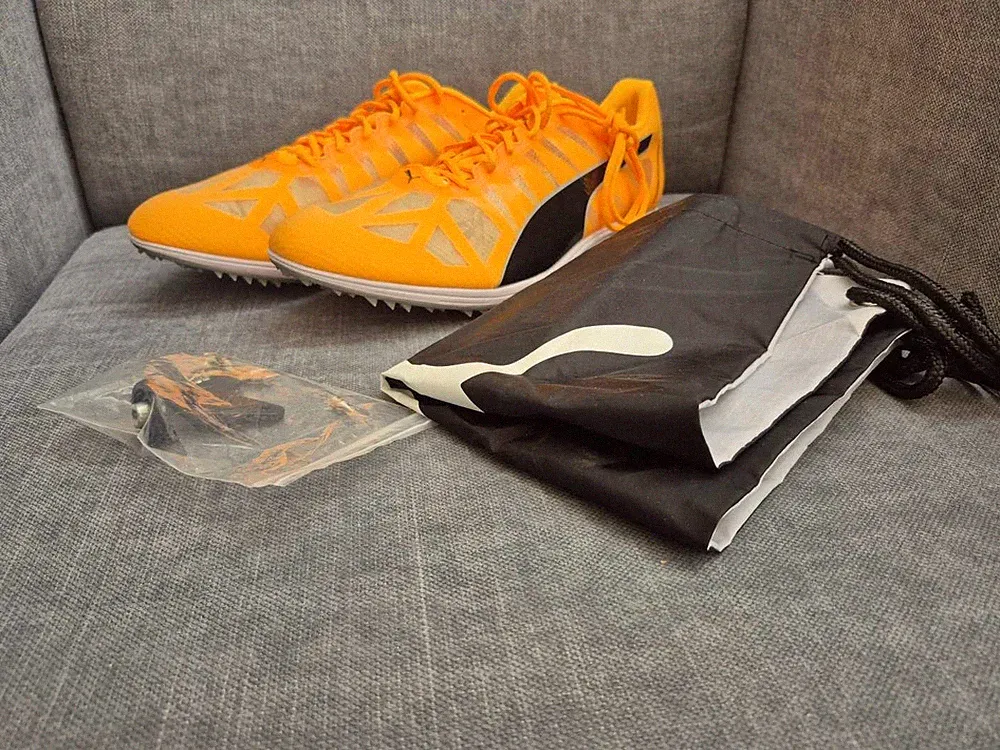 Neue Spikes PUMA evoSPEED Mid-Distance 4 Gr. 44 Herren Laufschuh sun-stream