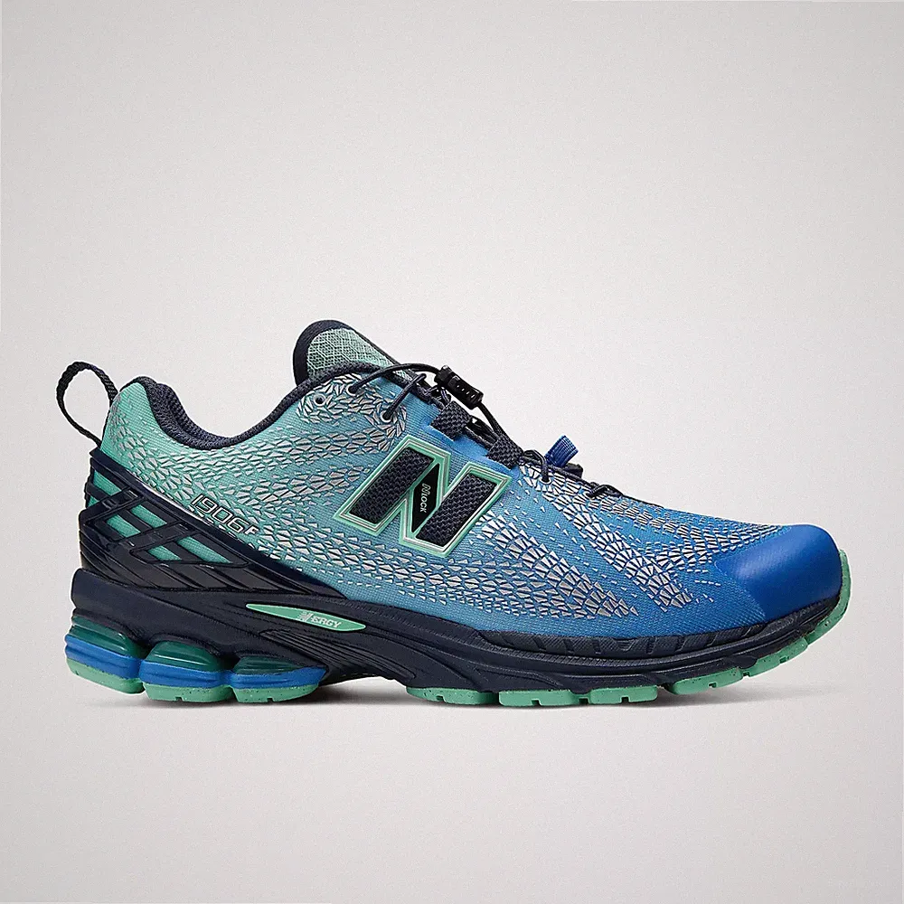 New Balance U1906F Sneaker Unisex Schuhe in Blau und Schwarz