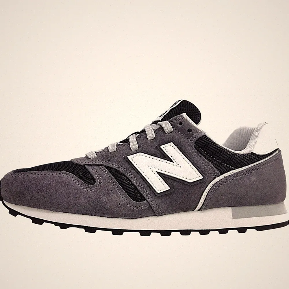 New Balance U373 Herren Laufschuh in Grau