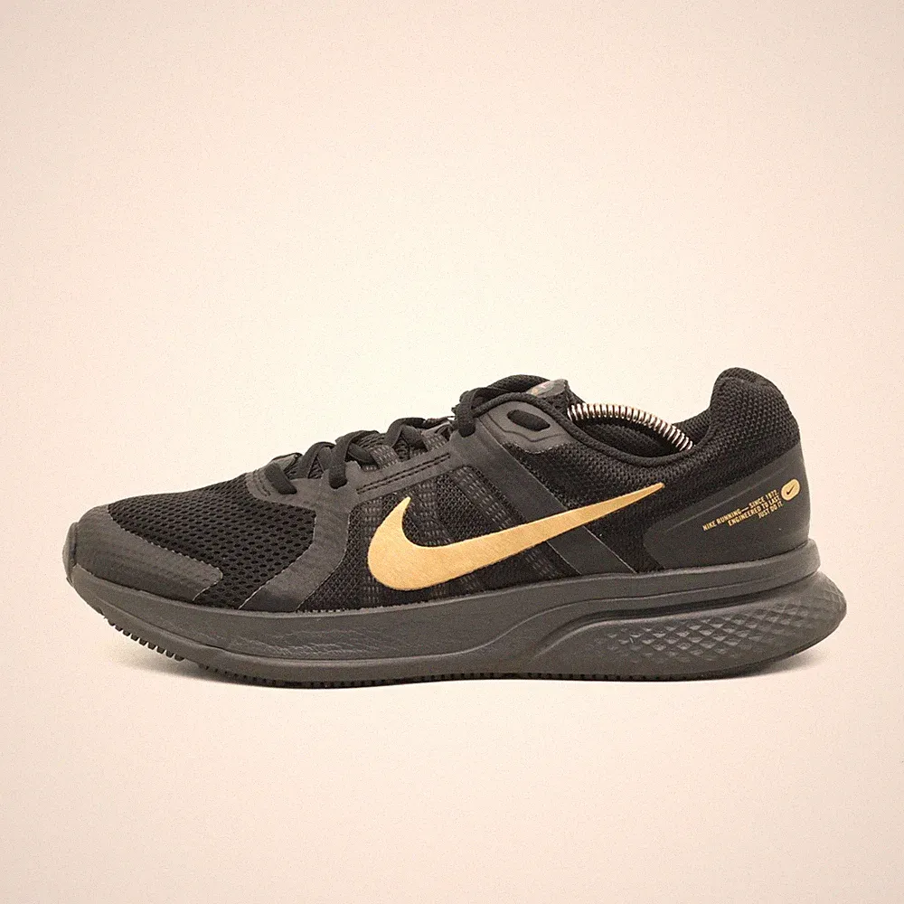 Gold Laufschuh