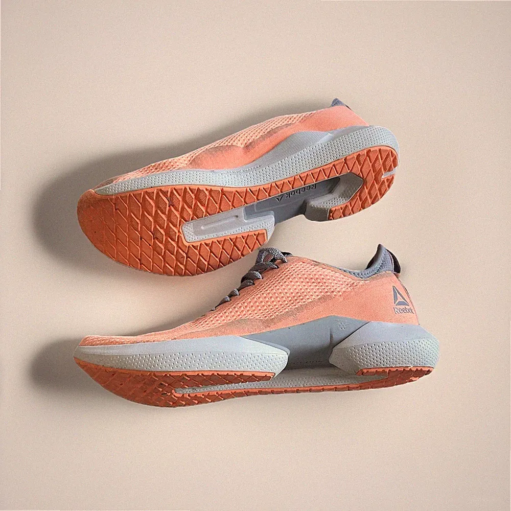 Reebok Herren Laufschuhe Sneaker Sportschuhe Lachs Orange Grau Größe 42,5